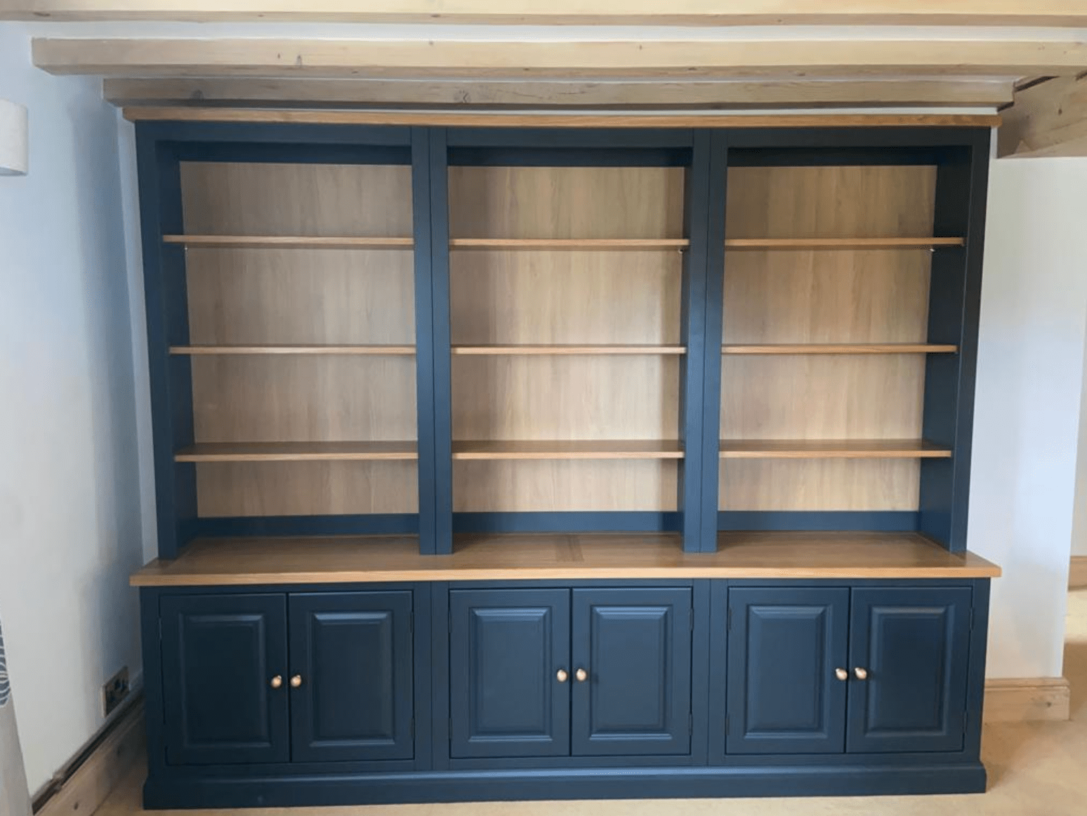tall, wide cabinet with shelves